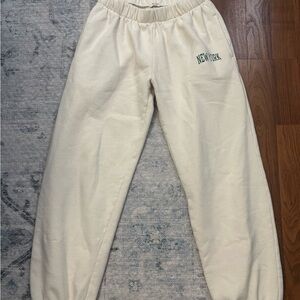Brandy Melville Cream Sweatpants with Green Print